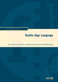 Tactile sign language: turn taking and questions in signed conversations of deaf-blind people